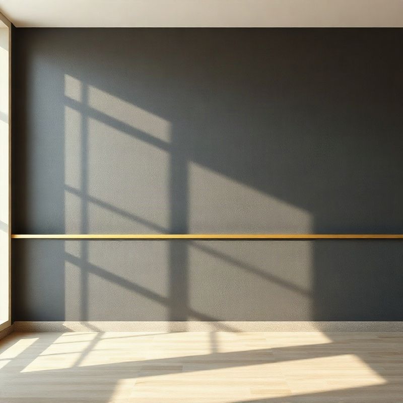 Charcoal office wall with a single gold horizontal line detail